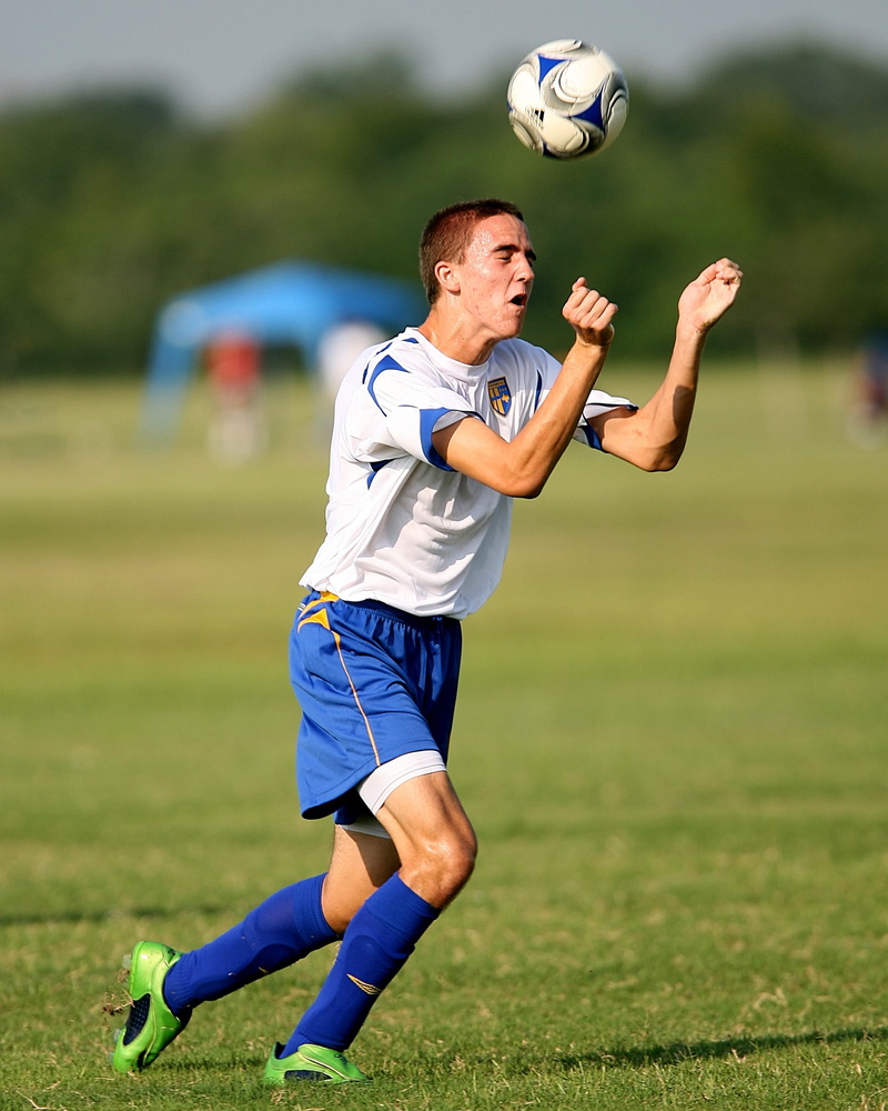 football, focusing, player, soccer, outdoors, soccer ball, summer, shooting at goal, active, playing, soccer player, head, sports activity, soccer uniform