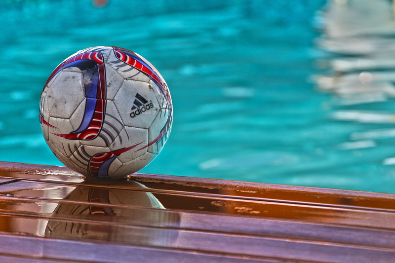 football, wood - material, sphere, swimming pool, nature, sport, blue, kick, travel destinations, goal, water, day, focus on foreground, outdoors, 5K