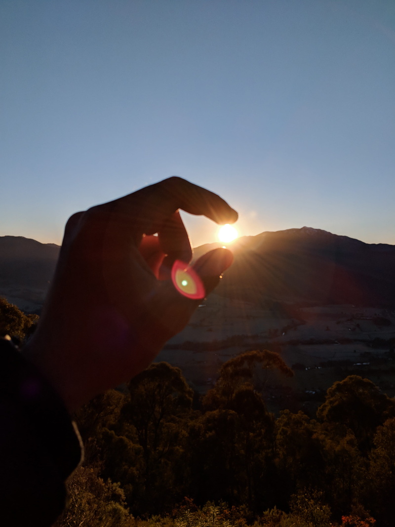 bright, sunbeam, outdoors, lens flare, human hand, germantown, real people, beauty in nature, sullivans lookout, sky, finger, one person, human body part