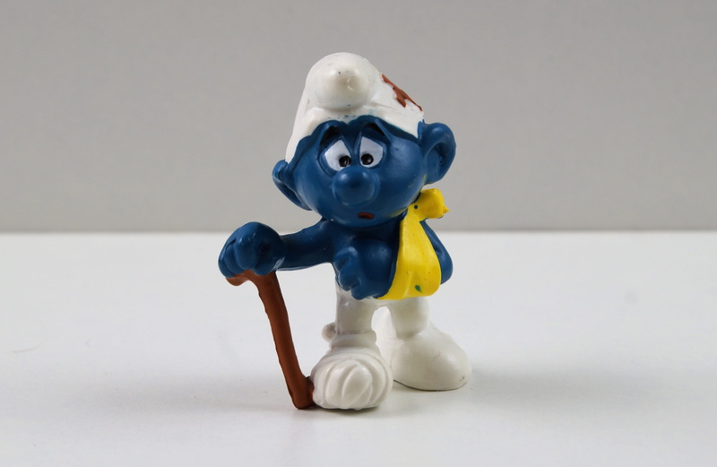two objects, gray background, decoration, figurine, single object, toy, ill, Smurf, 4K, plastic, male likeness, Toys, doctor, still life, studio shot