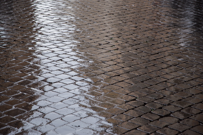 italy, textured, security, high angle view, pattern, paving, barrier, boundary, no people, floor, cobble, stone, day, street, rain, chainlink fence, nature