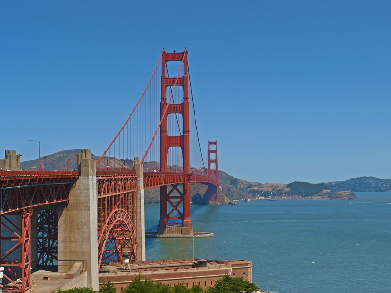 bay of water, golden gate, built structure, golden gate bridge, ocean, architecture, tower, clear sky, day, bridge - man made structure, tourism, industry