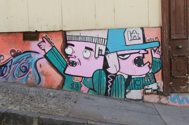 sidewalk, wall - building feature, no people, mural painting, Graffiti, female likeness, art and craft, human representation, day, multi colored, built structure