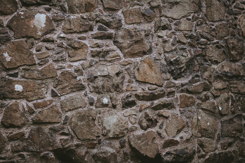 close-up, outdoors, wall - building feature, rock - object, stone material, history, built structure, united kingdom, cobblestone, no people, full frame