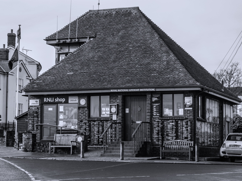 uk, shop, roof tile, 2K, no people, road, car, roof, city, built structure, day, street, charity, architecture, building exterior, transportation, rnli