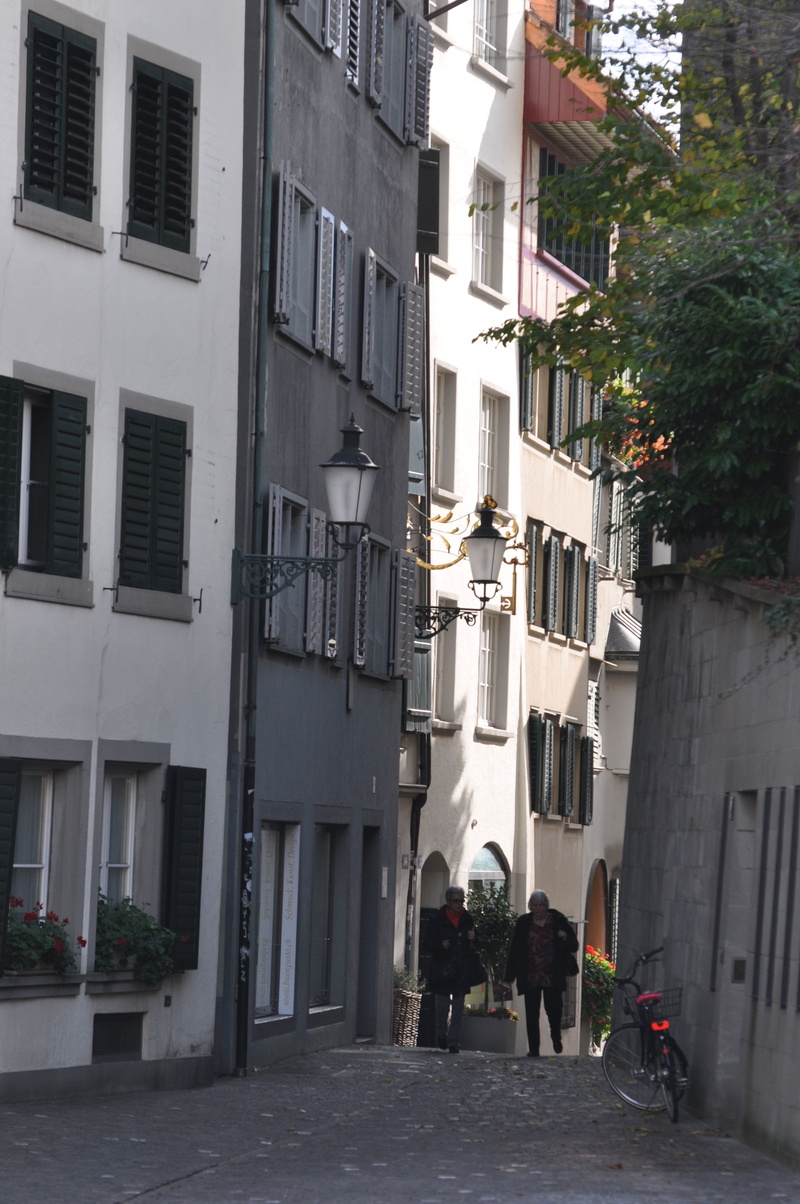 rear view, men, historic, real people, residential building, Zurich, walking, window, leisure activity, road, Old, building, cityscape, outdoors, town