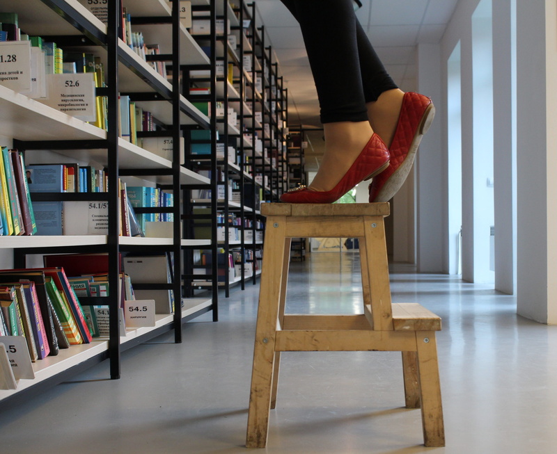 standing, home interior, publication, body part, human limb, stand, 4K, ladder, library, stool, flooring, shoes, indoors, real people, get, leisure activity