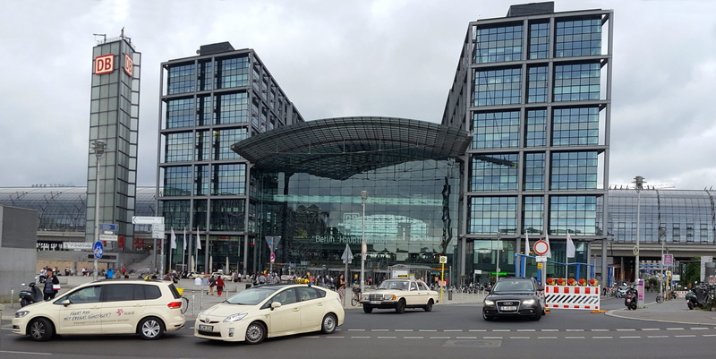 travel, road, central station, skyscraper, city life, building exterior, outdoors, 4K, built structure, mode of transportation, day, architecture, sign