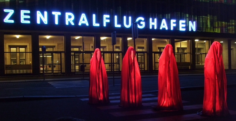 city, neon, central airport, berlin, people, illuminated, building, built structure, architectural column, women, adult, religion, guard, lighting equipment