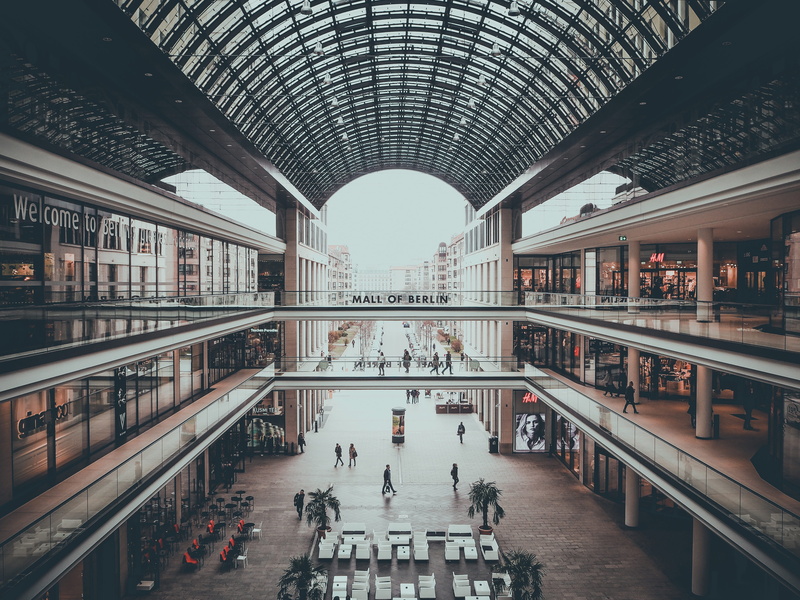 high angle view, travel destinations, modern, mall, arch, crowd, real people, day, berlin, building, building exterior, lifestyles, shops, tourism, city