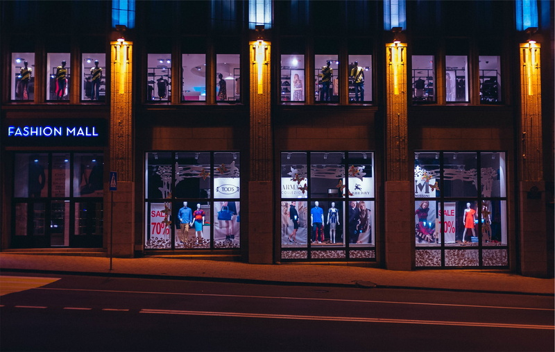 building exterior, book, window, building, outdoors, nightlife, mall, architecture, fashion, night, street, city, publication, group of people, group, clothes