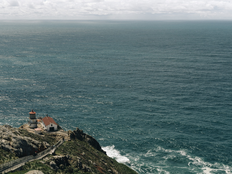 tranquil scene, idyllic, no people, house, tranquility, road, horizon, sea, high angle view, white, wafe, front, building, cloudscape, travel destinations