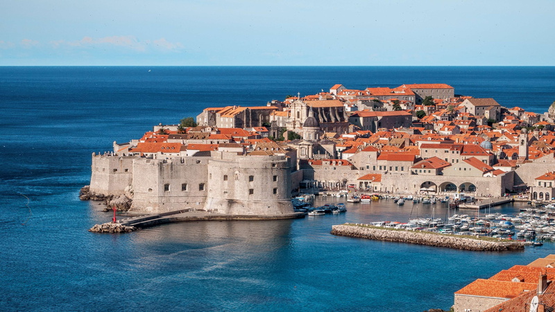 boat, blue, fort, history, water, city, europe, houses, building exterior, transportation, castle, sea, no people, nautical vessel, fortress, beach, travel