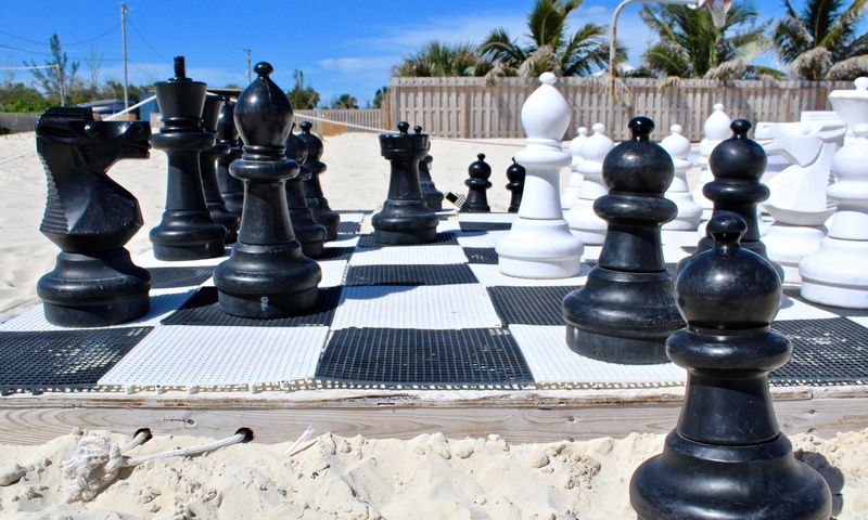 leisure activity, land, the bahamas, solid, queen - chess piece, shadow, game, strategy, sunlight, 4K, beach, relaxation, check, outdoors, sand, king - chess piece