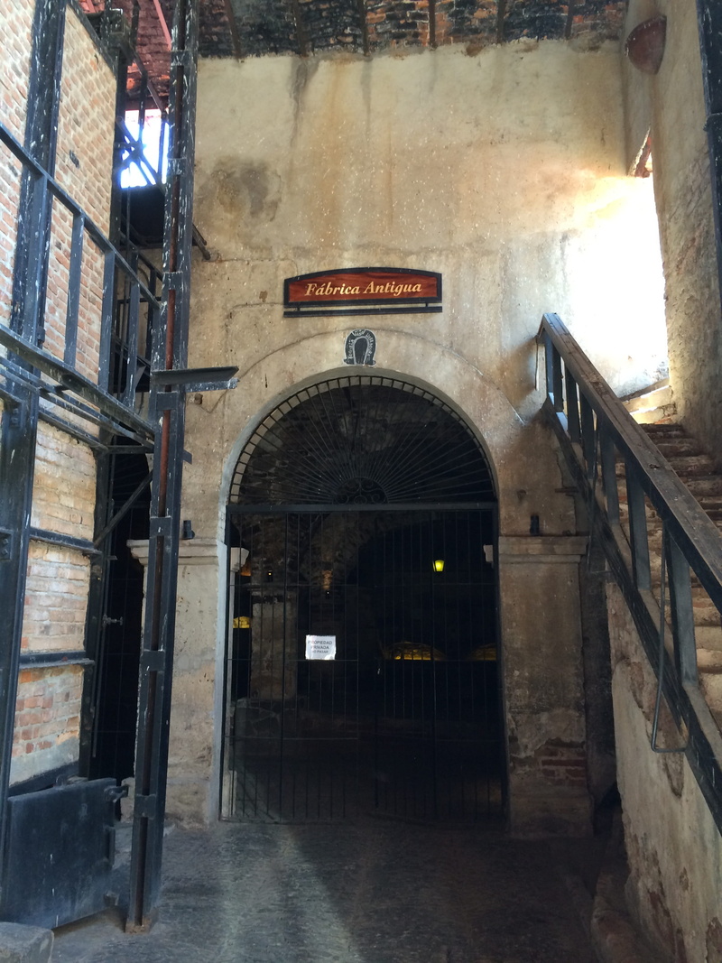 tequila, arched, outdoors, building, gate, Old, the past, building exterior, entrance, antique, 2K, direction, day, sign, old factory, communication, Architecture
