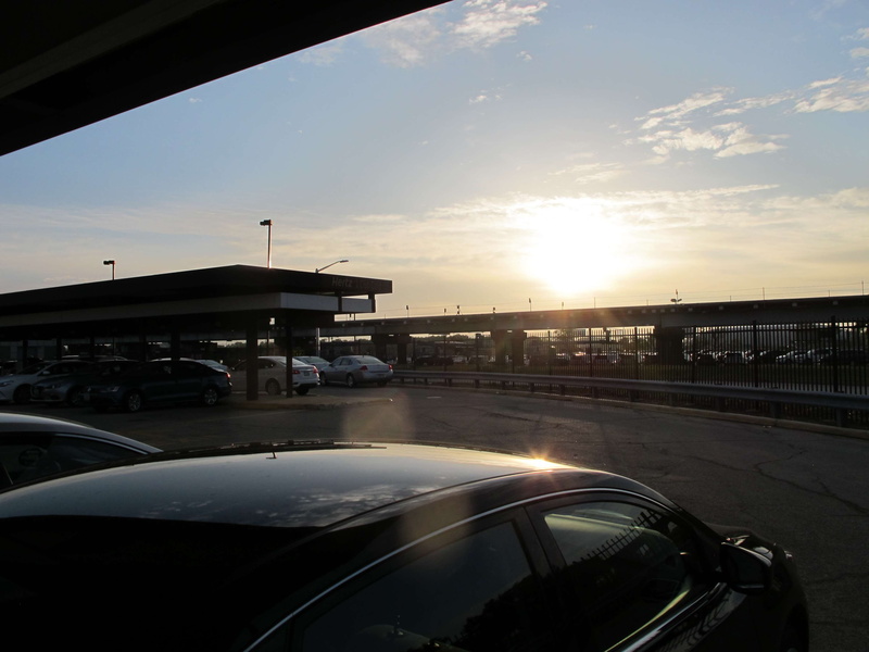 rental cars, sunset, ohare, vehicle interior, road, cloud - sky, bright, travel, sunrise, land vehicle, parking lot, sunbeam, transportation, mode of transportation