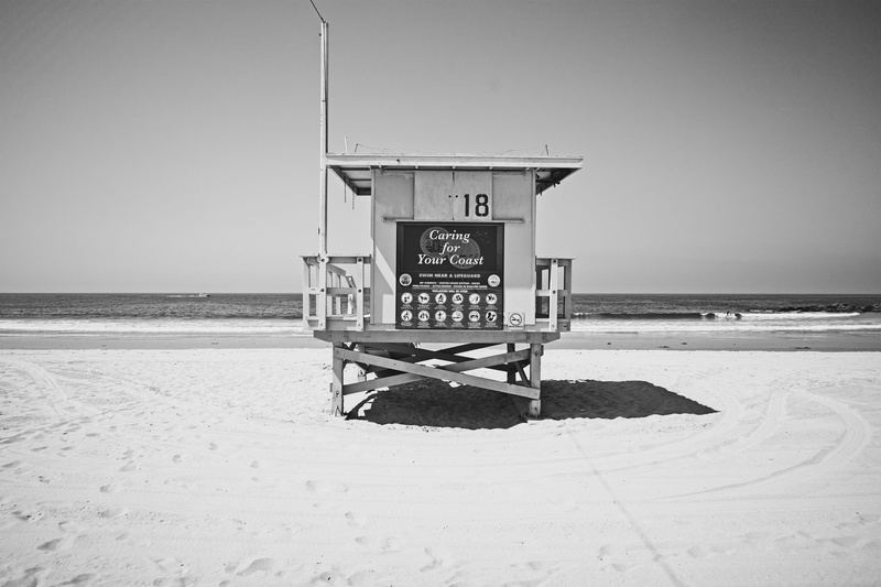 rural, water, bench, lifeguard station, land, grayscale, safety, day, chair, lifeguard hut, ocean, lifeguard, building, nature, horizon over water, built structure