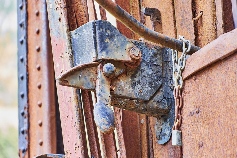 day, rusty, door, latch, lock, train, iron, close-up, focus on foreground, deterioration, weathered, outdoors, decline, 5K, no people, abandoned, entrance