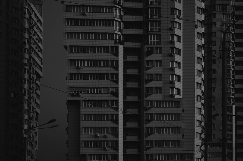 architecture, urban, built structure, town, outdoors, high rise, sky, skyscraper, facade, no people, office building, buildings, noir, window, building exterior