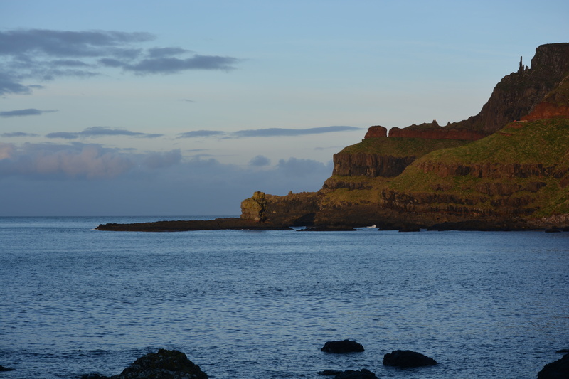 water, waterfront, rock - object, rock formation, cliff, rock, northern ireland, outdoors, cloud - sky, land, no people, idyllic, tranquil scene, rocky coastline