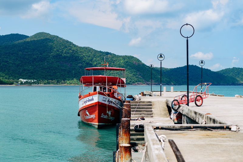 orange, incidental people, outdoors, scenics, tree, mountain, scenics - nature, transportation, yacht, nature, island, nautical Vessel, landscape, sea