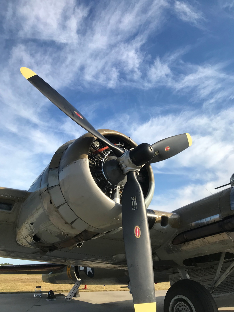 day, 4K, engine, land vehicle, ww2 bomber, travel, airplane, sunlight, air vehicle, stationary, boeing b-17, plane, outdoors, nature, cloud - sky, propeller
