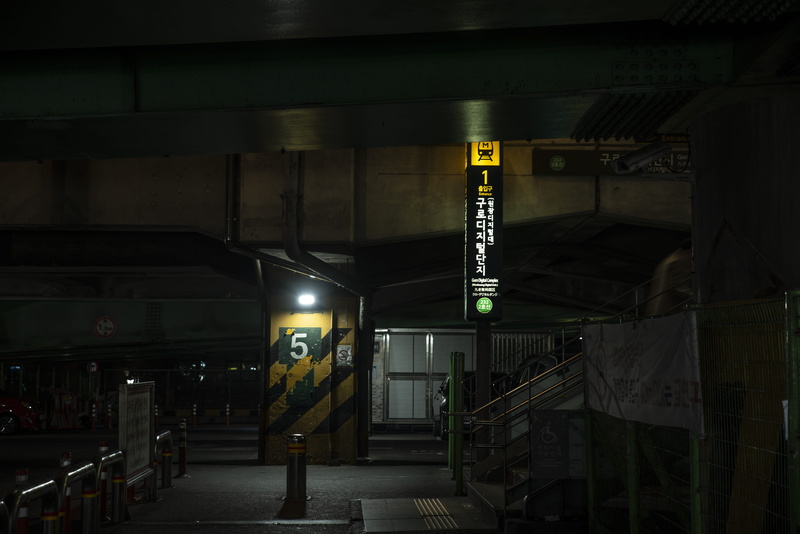 communication, bridge, mode of transportation, transportation, light, subway, one person, train, illuminated, night, lighting, indoors, street photography