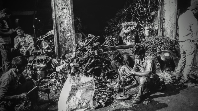 india, building, mumbai, garages home, damaged, man working, machine, cst road, human representation, belief, no people, built structure, transportation