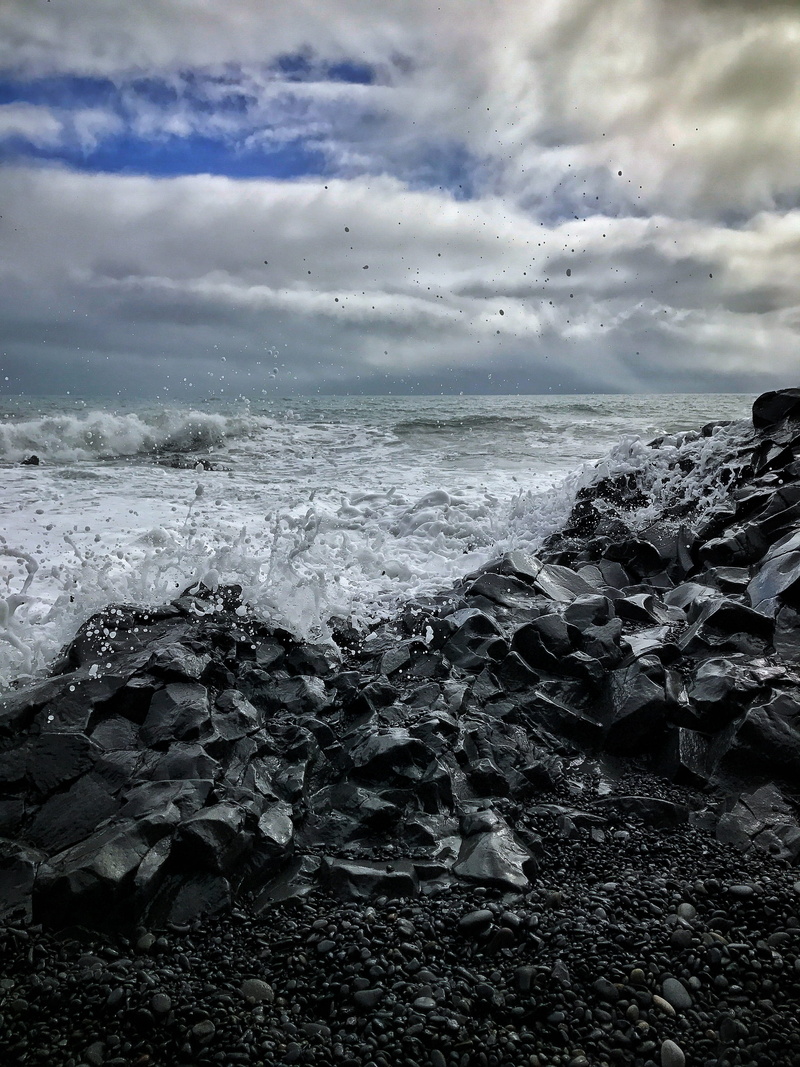 water, aquatic sport, motion, sky, beach, sea, land, iceland, horizon, sport, adventure, cloud - sky, rock - object, beauty in nature, travel, wave, splash