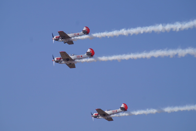nature, aerobatics, Plane, aerospace industry, airshow, mode of transportation, day, military, vapor trail, teamwork, stunt, sky, no people, flying, blue