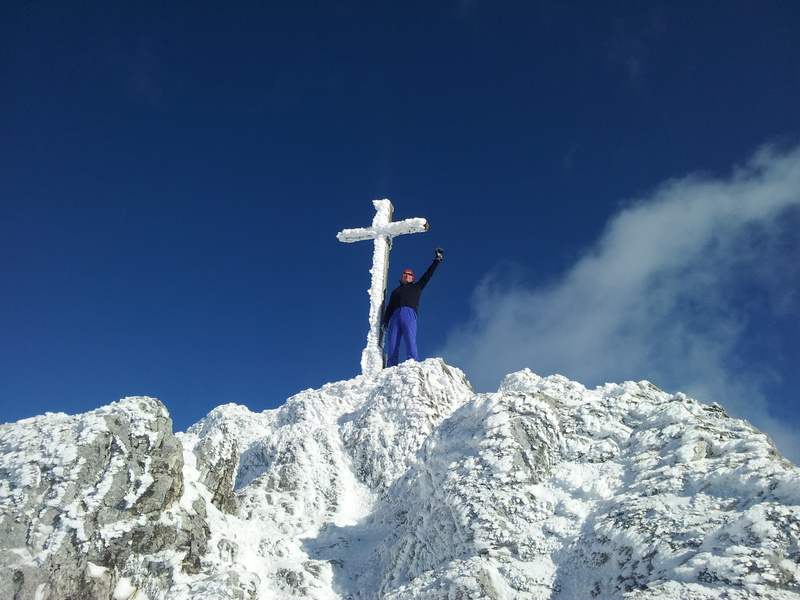 view, mountain, winter, human limb, full length, sunlight, cold, one person, cross, sport, top, limb, white, cloud, cold temperature, ice, mountain peak