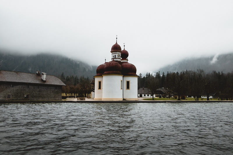 dome, built structure, place of worship, painted, mountains, sky, fog, water, waterfront, plant, mystical, spire, building, church, religion, germany, lake