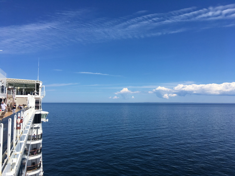sky, queen elizabeth, blue, ship, outdoors, cruise, cruise ship, seafaring, mode of transportation, day, built structure, Sea, architecture, cloud - sky