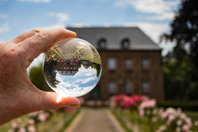 focus on foreground, built structure, plant, human Hand, glass - Material, historically, environment, close-up, 4K, town hall, glass ball photo, niederzier
