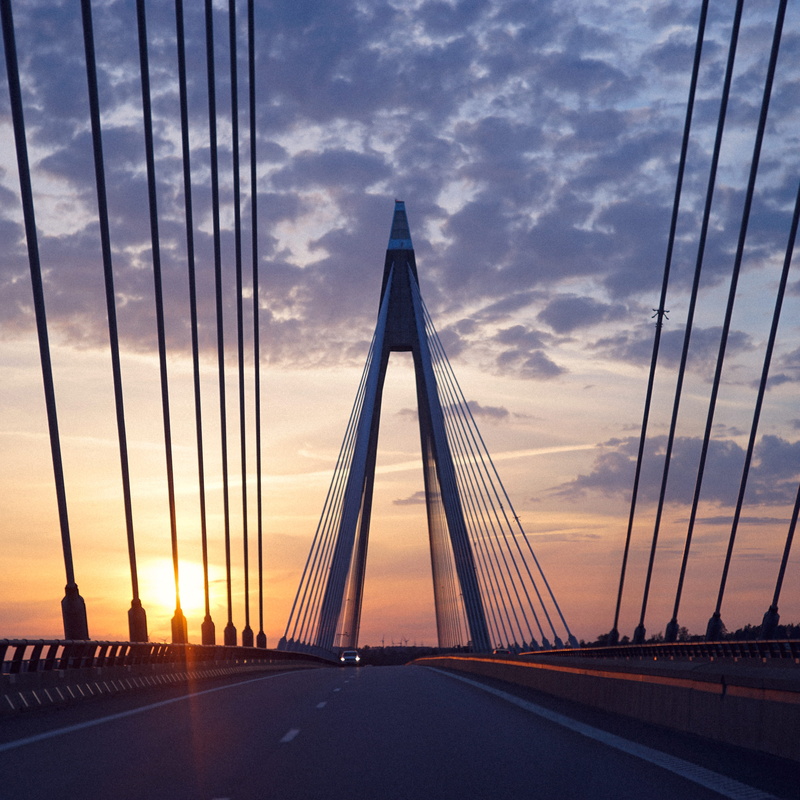 steel cable, bridge, road, direction, bridge - man made structure, cloud - sky, the way forward, transportation, sky, cable-stayed bridge, suspension bridge