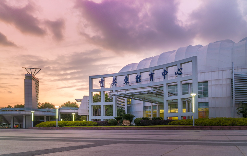 new stadium, building, holly body, center, office building exterior, fok ying tung sports center, cloud - sky, road, travel, dusk, sign, blue, sky, built structure