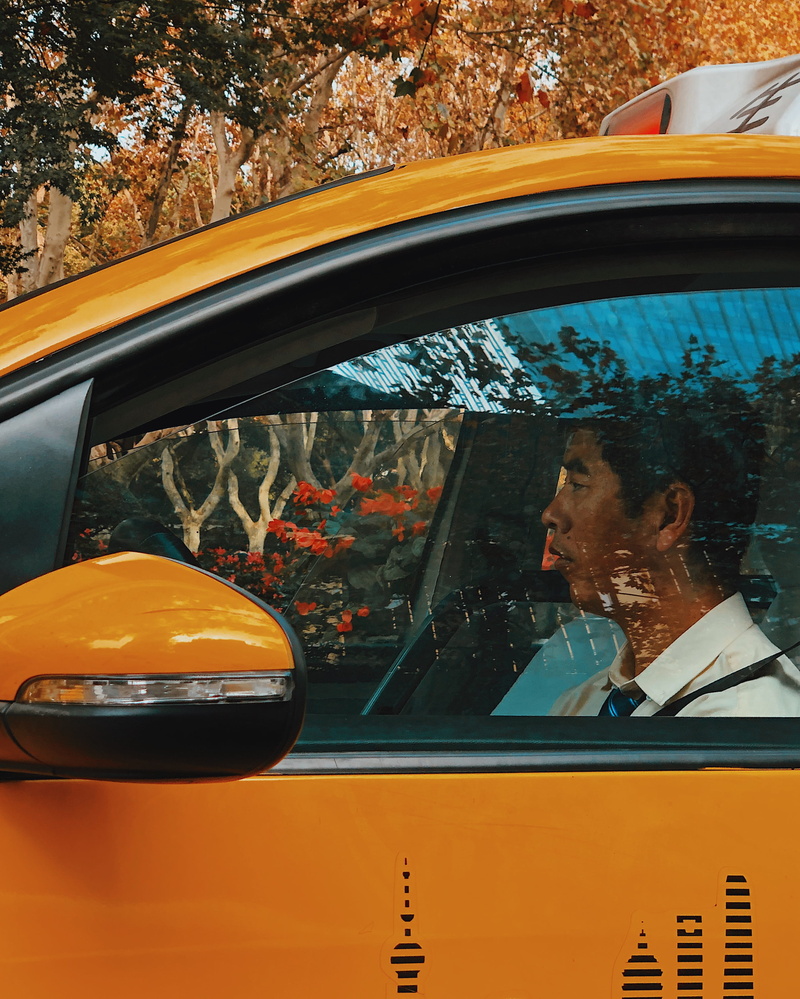 outdoors, orange color, human, 2K, tire, reflection, vehicle interior, man, men, light, land vehicle, looking, transportation, mature men, car, spoke