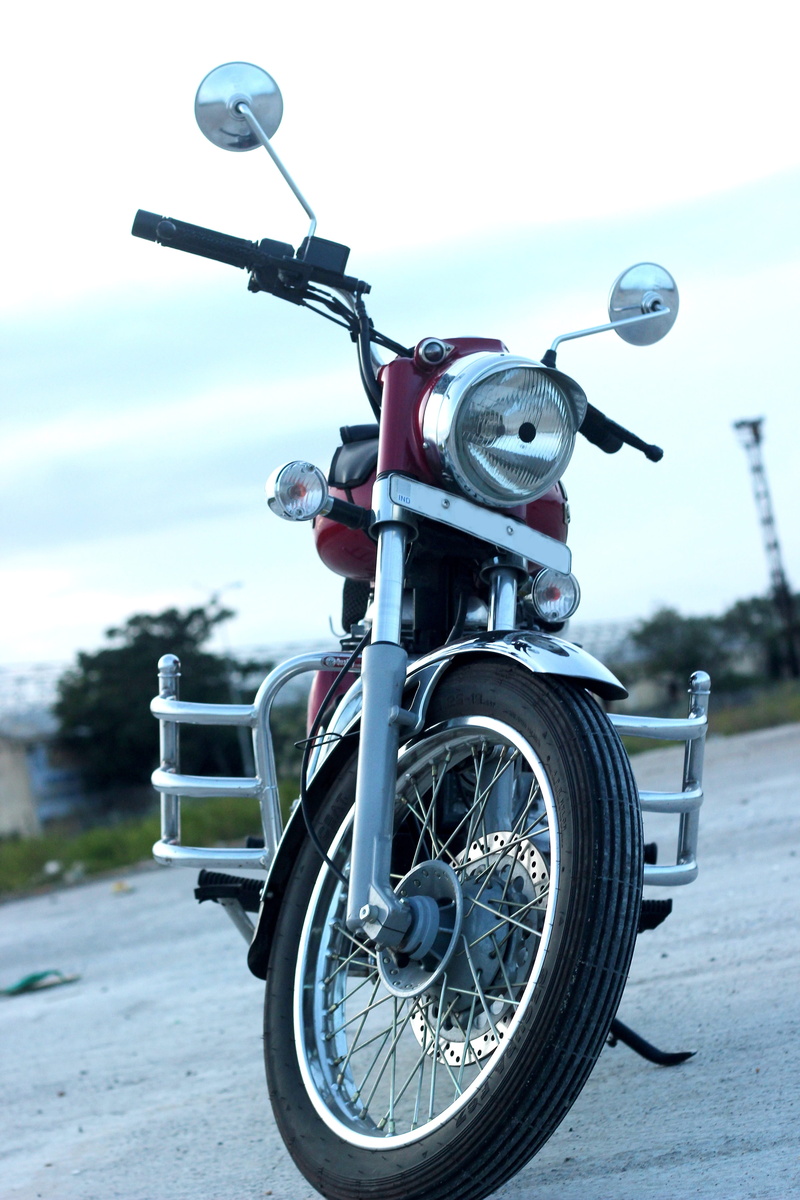 motor scooter, no people, scooter, nature, sky, city, street, outdoors, 5K, stationary, day, wheel, transportation, land vehicle, bike, mode of transportation