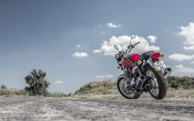 full length, adventure, transportation, red, sports Race, ride, one person, Honda cb1100, action, competition, men, outdoors, dirt Road, cloud - sky, motorsport