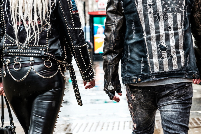 focus on foreground, towards, person, black, standing, two people, casual clothing, chains, men, leather, rock, people, 4K, holding, women, rear view