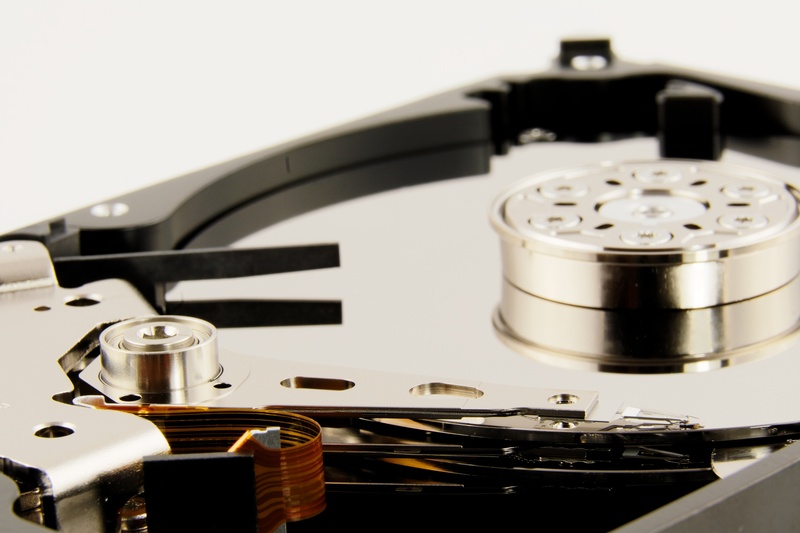 studio shot, indoors, arts culture and entertainment, hdd, black, hard drive, electrical equipment, memory, pc, silver, metal, computer, disc, still life