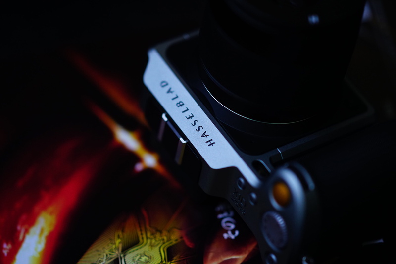 camera lens, communication, number, photography themes, no people, close-up, photo, tattoo, strap, photography, black background, skin, computer keyboard