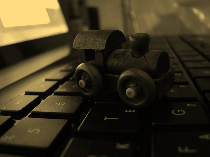 communication, technology, office, laptop, ideas, locomotive, alphabet, keyboard, indoors, wireless technology, toy, surface, business, cast, typing, push button