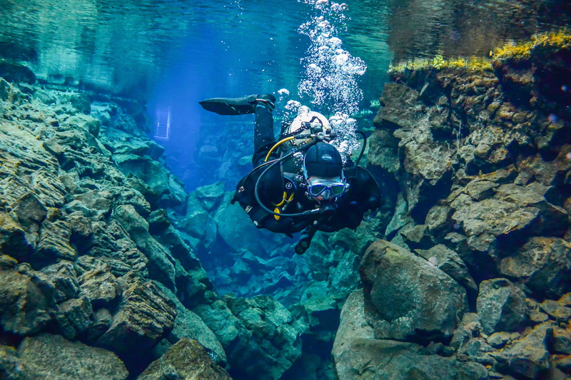 tectonic plate gap, rock, scuba diving, rock - object, hobby, water sports, deep, compressed air, fins, trilaminate, volcano, dive, diving, door gravel