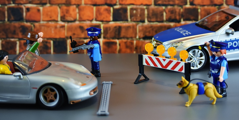 figurine, transportation, toys, policewoman, close-up, brand tape, representation, crime, indoors, dog, motorcycle, control, motor vehicle, metal, playmobil