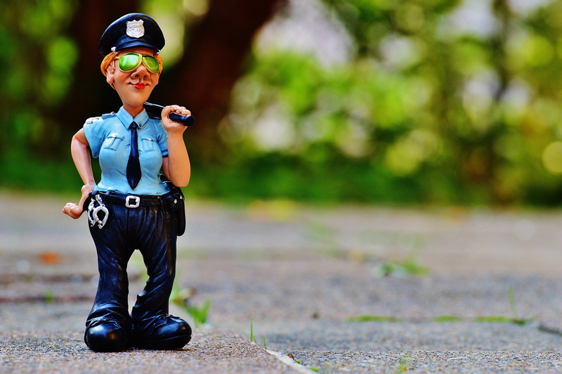 police, photography, policewoman, funny, sunglasses, sport, males, outdoors, focus on foreground, full length, government, security, action, front view
