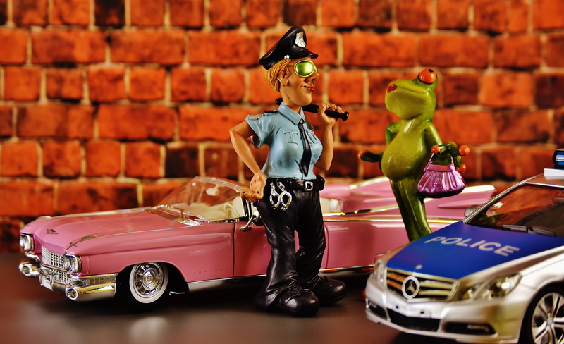 retro styled, mode of transportation, 5K, male likeness, motor vehicle, figurine, brick, toy car, day, funny, policewoman, El Dorado, focus on foreground