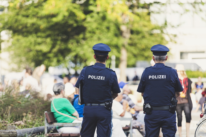 police officers, rear view, special forces, police force, outdoors, technology, focus on foreground, government, de most ration, men, city, law, uniform