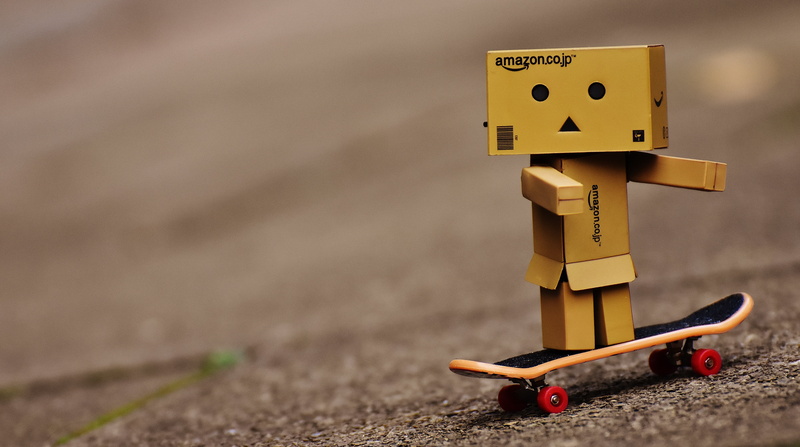 wood - material, focus, block, childhood, robot, skateboard, small, human representation, futuristic, wooden, transportation, man, funny, outdoors, nature