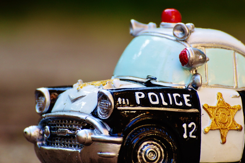 metal, text, retro Styled, motorcycle, outdoors, car, Retro, still life, no People, western script, police, safety, focus on foreground, Police Car, model car
